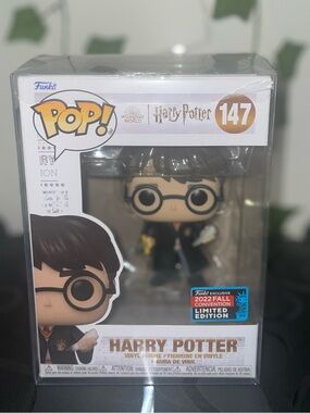 Funko Harry Potter Vinyl Figure with Black Robe and Gold Accents